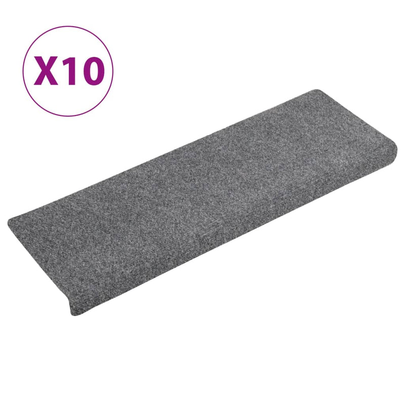 vidaXL 10 db világosszürke tűlyukasztott lépcsőszőnyeg 65x21x4 cm