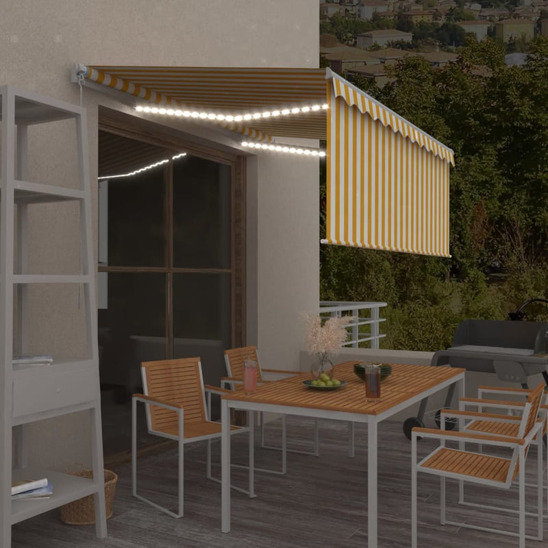 vidaXL sárga-fehér kézzel kihúzható LED-es napellenző redőnnyel 3x2,5m