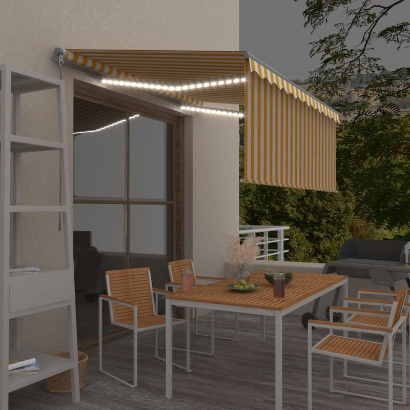 vidaXL sárga-fehér kézzel kihúzható LED-es napellenző redőnnyel 3x2,5m