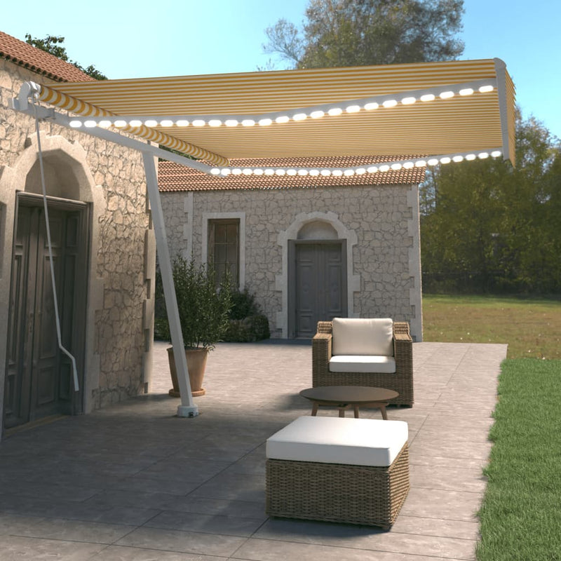 vidaXL sárga és fehér kézzel kihúzható LED-es napellenző 400 x 350 cm