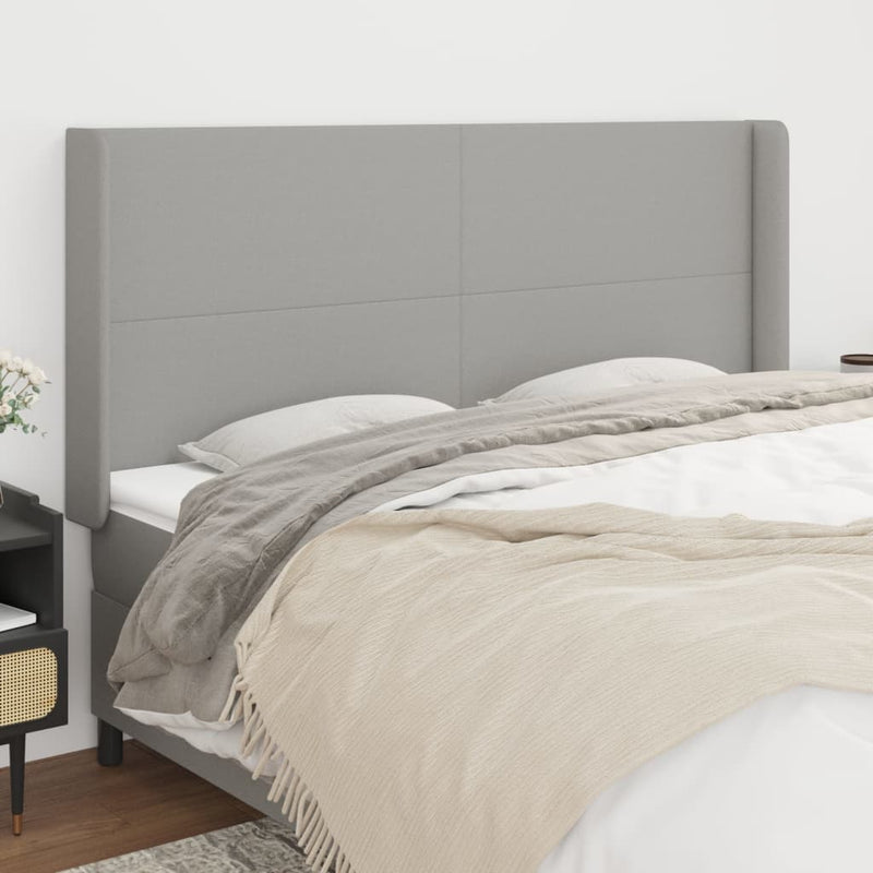 vidaXL világosszürke szövet fejtámla szárnyakkal 203x16x118/128 cm