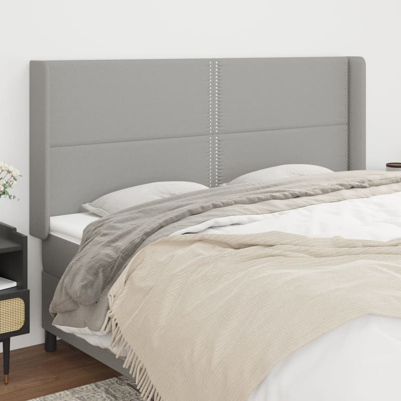 vidaXL világosszürke szövet fejtámla szárnyakkal 203x16x118/128 cm