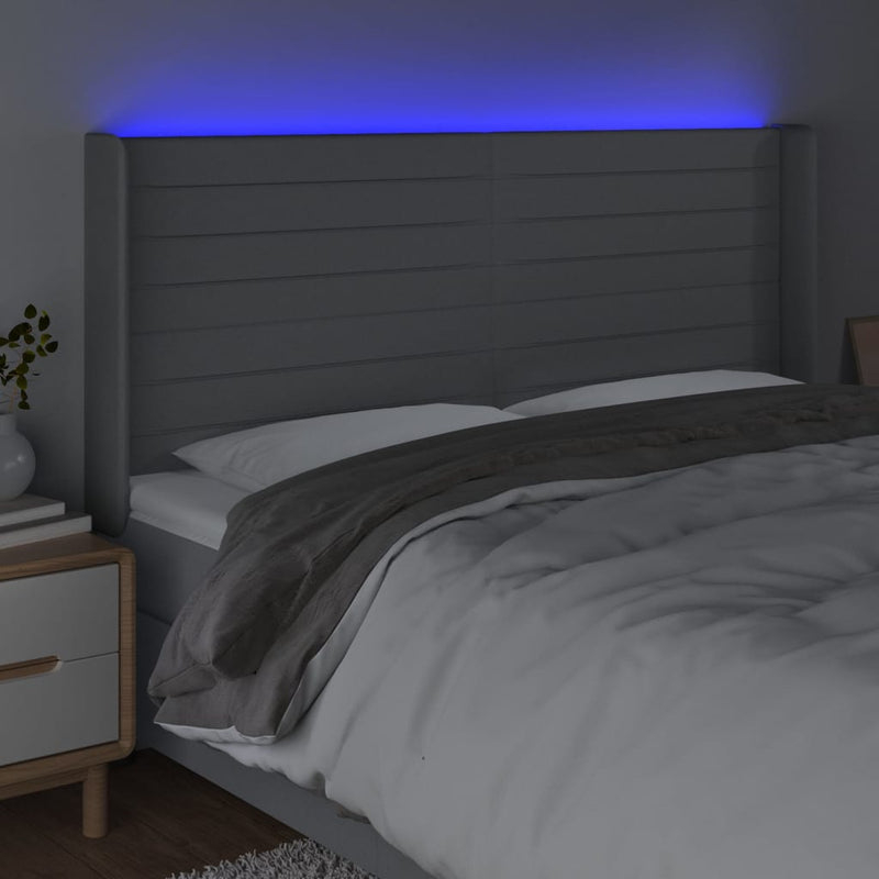 vidaXL világosszürke szövet LED-es fejtámla 163x16x118/128 cm