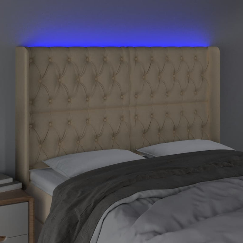 vidaXL krémszínű szövet LED-es fejtámla szárnyakkal 163x16x118/128 cm