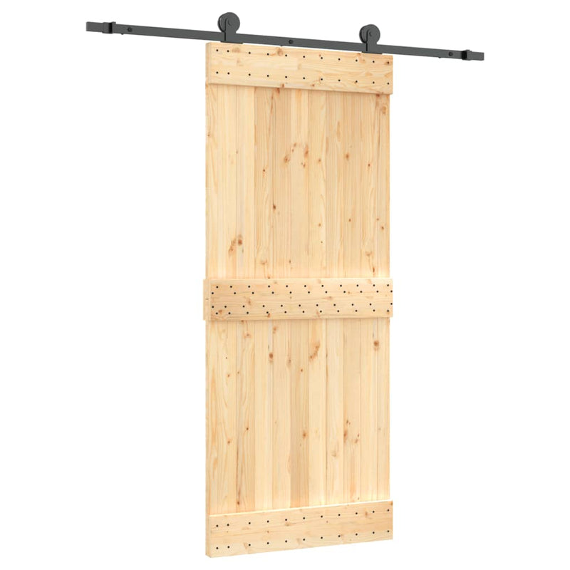 vidaXL tömör fenyőfa tolóajtó fémszerelékszettel 85x210 cm