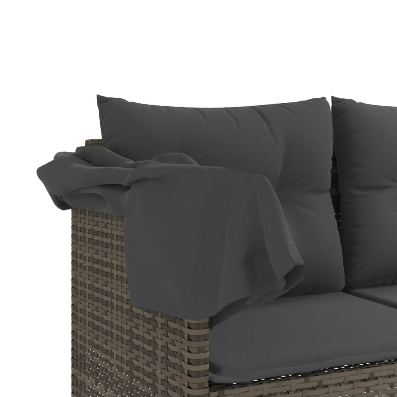 vidaXL szürke polyrattan napozóágy tetővel és párnával