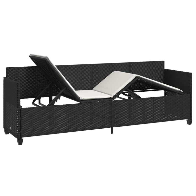 vidaXL fekete polyrattan napozóágy párnával