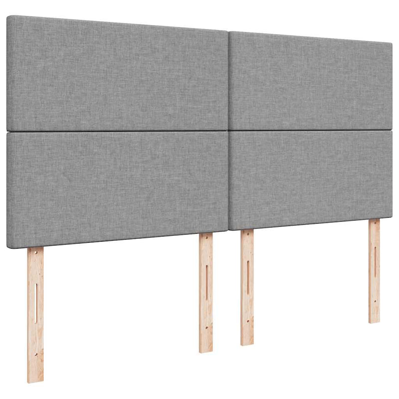 vidaXL Ottomán ágykeret matraccal világosszürke 160x200cm szövet