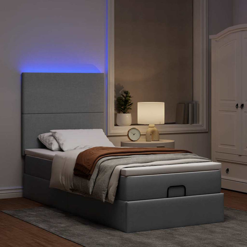 vidaXL világosszürke szövet ottomán ágy matraccal & LED-ek 80x200cm