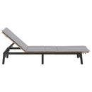 vidaXL bézs polyrattan napozóágy párnával