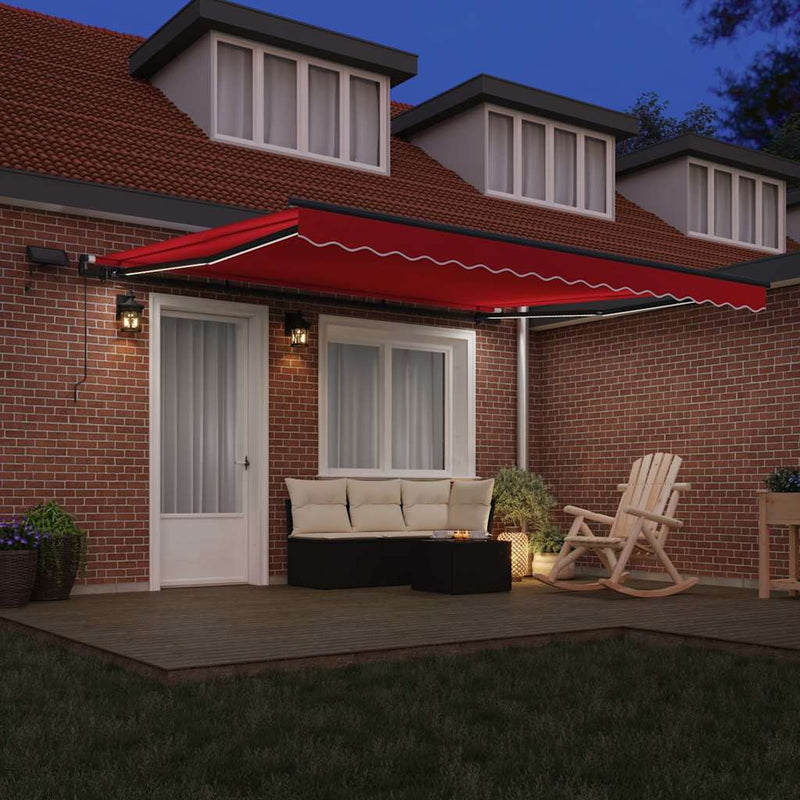 vidaXL Behúzható napellenző LED -es lámpákkal Piros 400 ×350 cm szövet