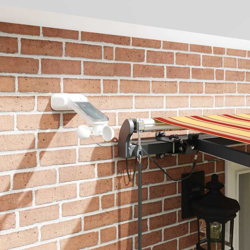 vidaXL Behúzható napellenző sárga és narancssárga 500 × 300 cm szövet