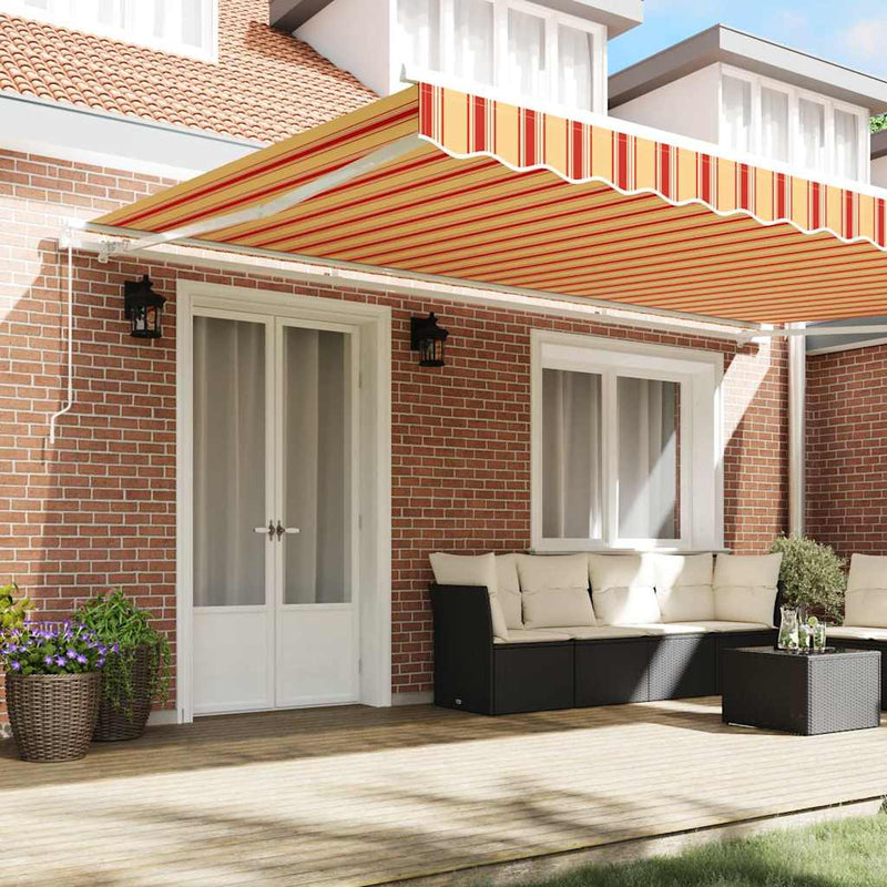 vidaXL Behúzható napellenző Csíkos Sárga és narancs 500 × 300 cm