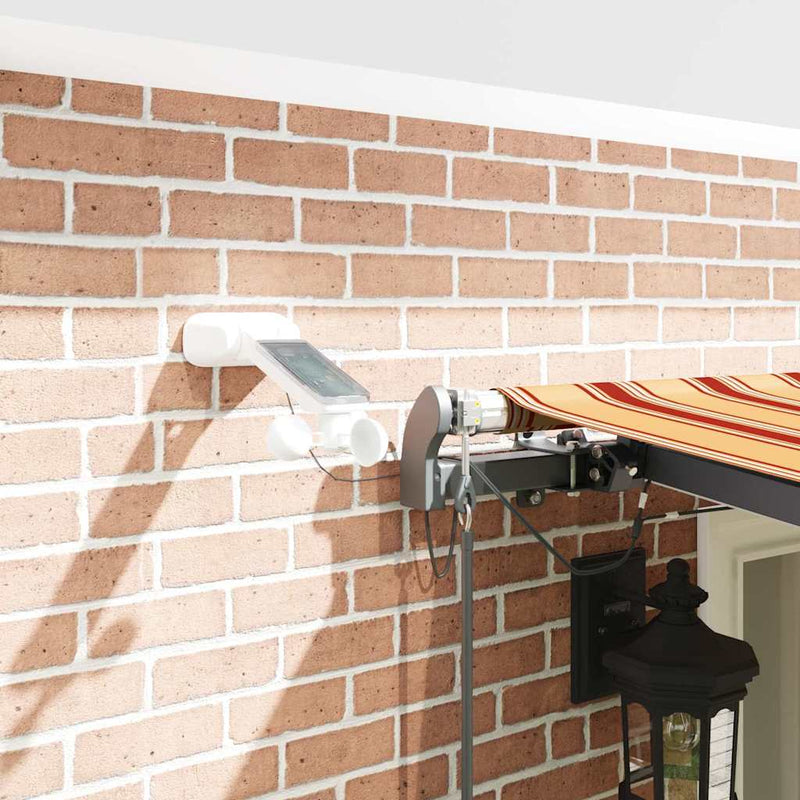 vidaXL Behúzható napellenző sárga és narancssárga 600 × 300 cm szövet