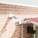 vidaXL Behúzható napellenző Piros és Fehér 600 × 300 cm Szövet és Fém