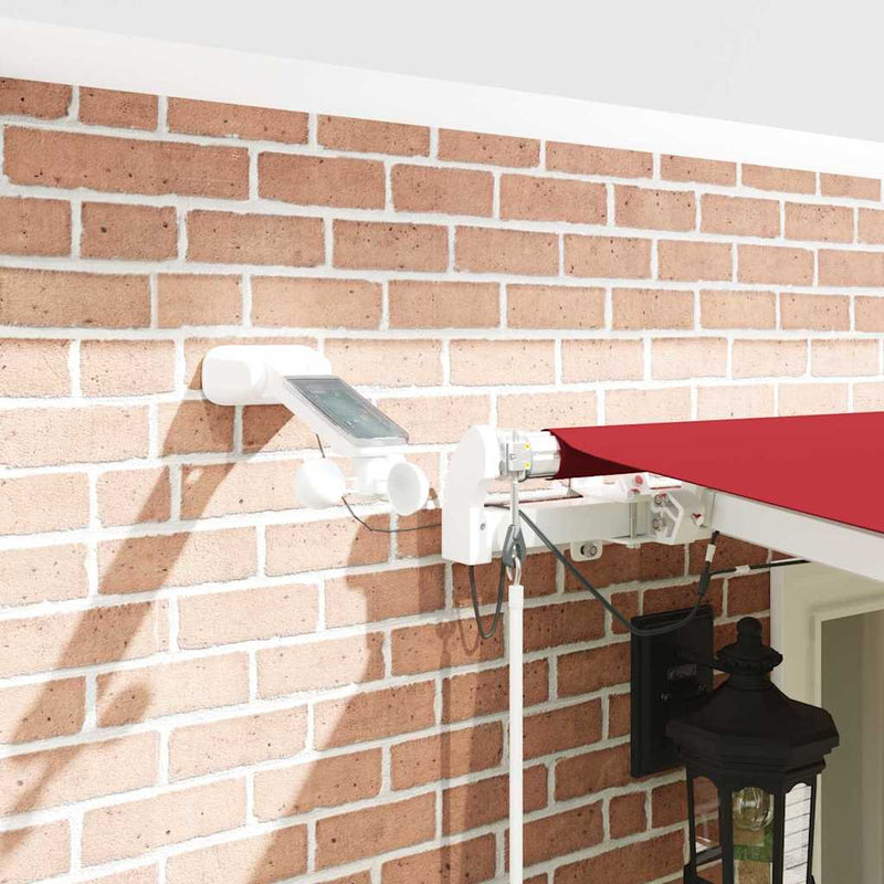 vidaXL Behúzható napellenző Piros 600 × 300 cm Szövet és Fém
