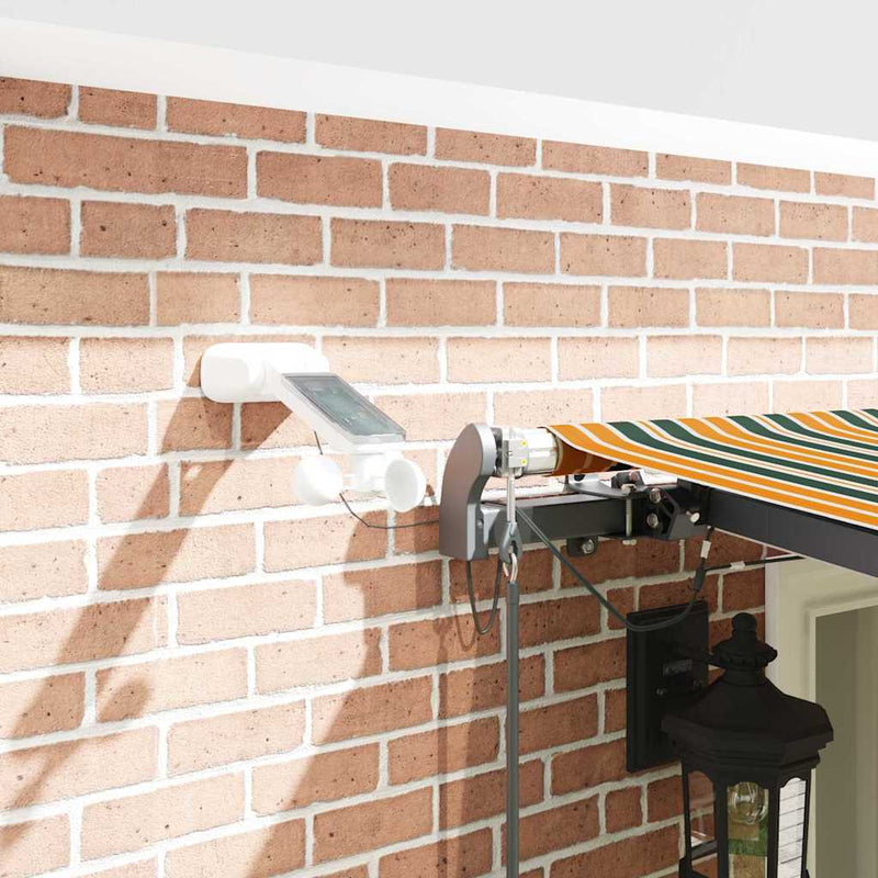 vidaXL Behúzható napellenző Zöld és sárga 600 × 300 cm szövet