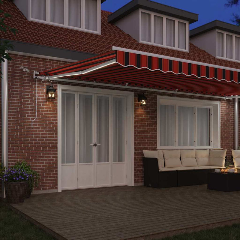 vidaXL Behúzható napellenző Narancs és Barna 600 × 350 cm