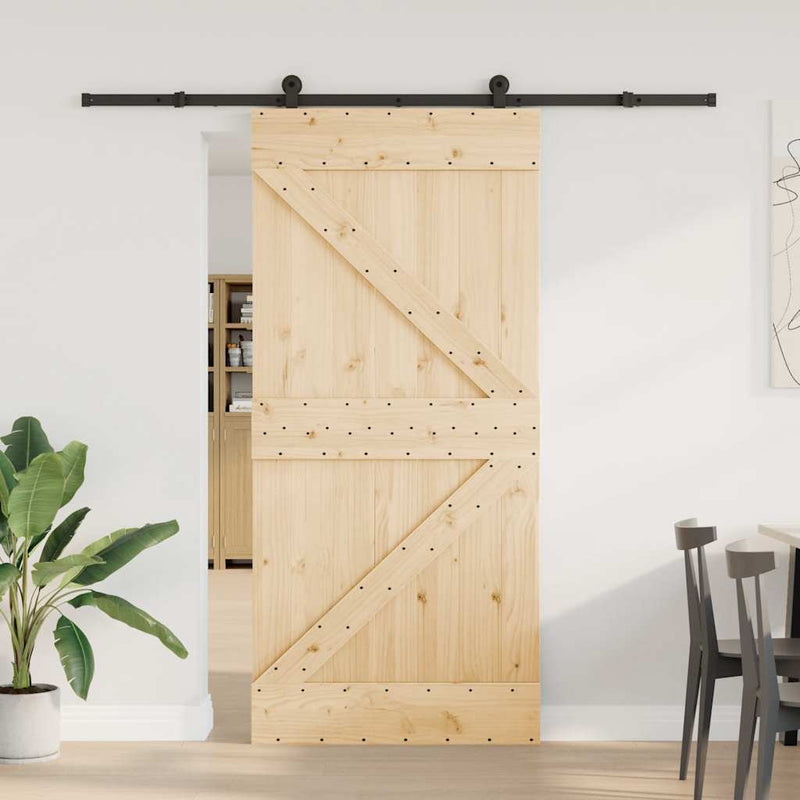 vidaXL tömör fenyőfa tolóajtó fémszerelékszettel 95 x 210 cm