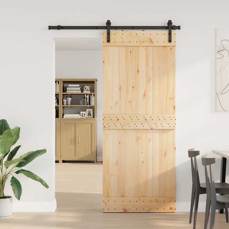 vidaXL tömör fenyőfa tolóajtó fémszerelékszettel 85x210 cm
