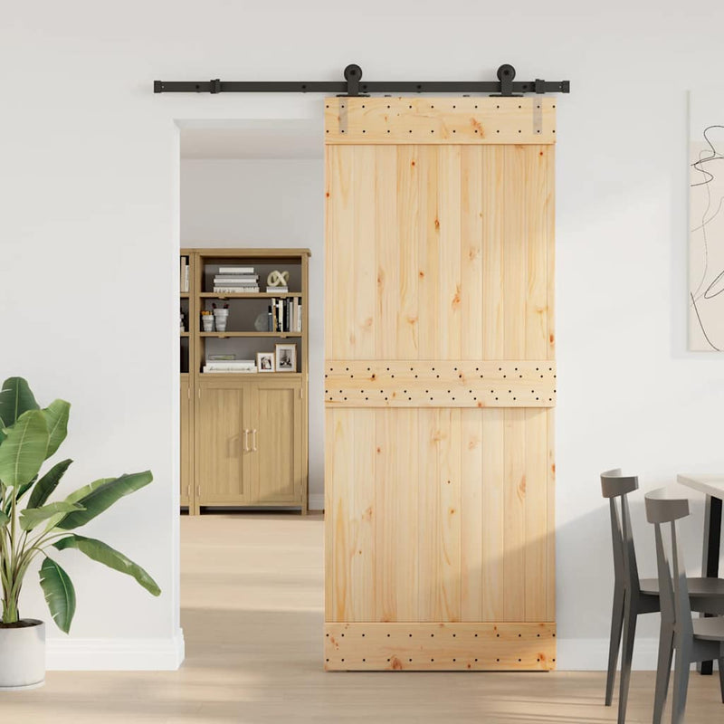 vidaXL tömör fenyőfa tolóajtó fémszerelékszettel 85x210 cm