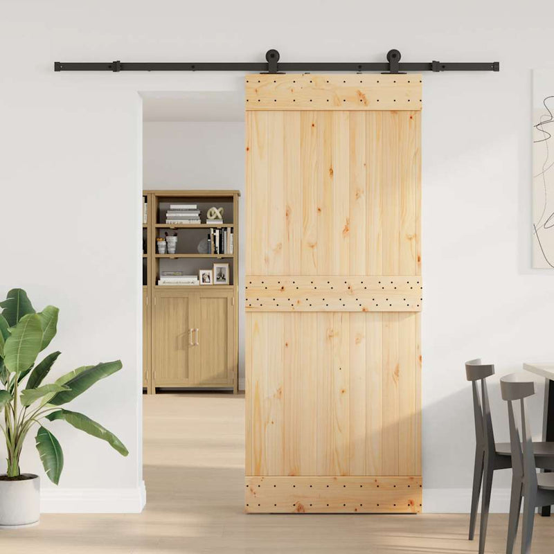 vidaXL tömör fenyőfa tolóajtó fémszerelékszettel 85x210 cm