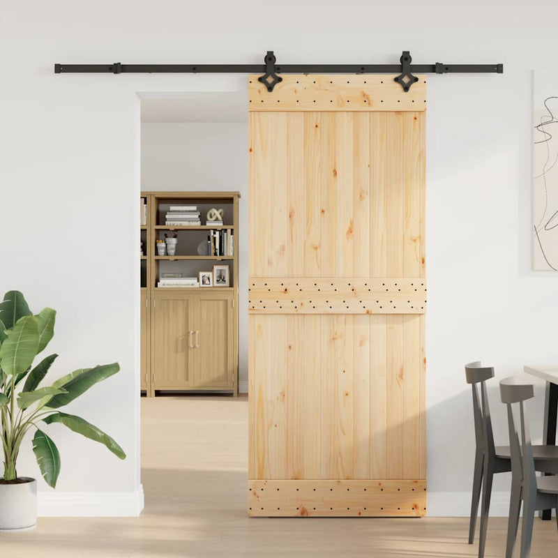 vidaXL tömör fenyőfa tolóajtó fémszerelékszettel 85x210 cm