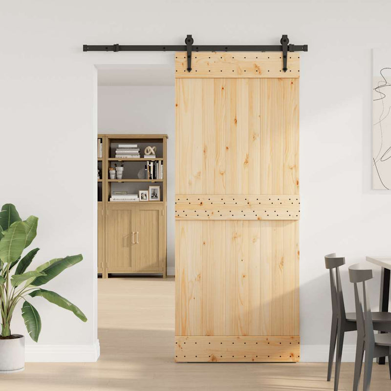 vidaXL tömör fenyőfa tolóajtó fémszerelékszettel 85x210 cm