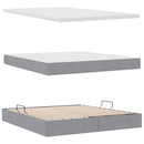 vidaXL Ágy tárolóval és LED lámpával Világosszürke 180 x 200 cm szövet