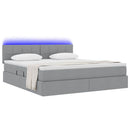 vidaXL Ágy tárolóval és LED lámpával Világosszürke 180 x 200 cm szövet