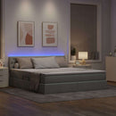 vidaXL Ágy tárolóval és LED lámpával Világosszürke 180 x 200 cm szövet