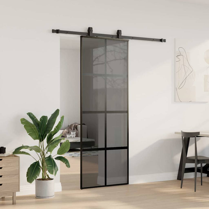 vidaXL fekete edzett üveg tolóajtó fémszerelék szettel 76x205 cm