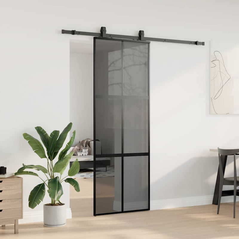 vidaXL fekete edzett üveg tolóajtó fémszerelék szettel 76x205 cm