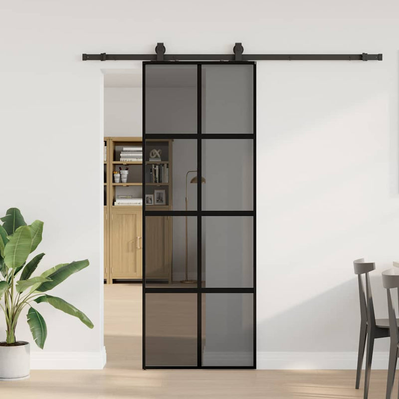 vidaXL fekete edzett üveg tolóajtó fémszerelék szettel 76x205 cm