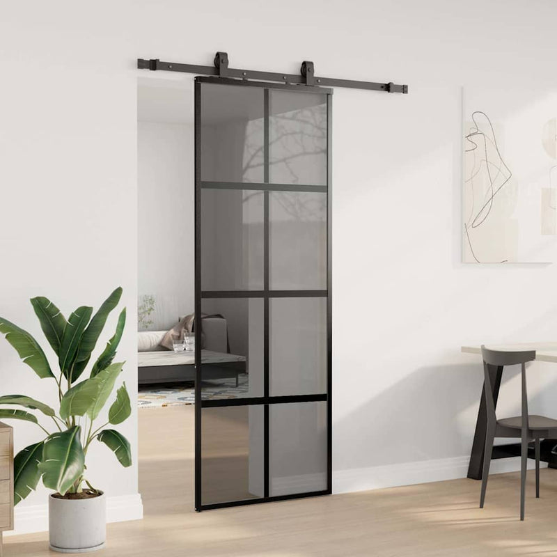 vidaXL fekete edzett üveg tolóajtó fémszerelék szettel 76x205 cm