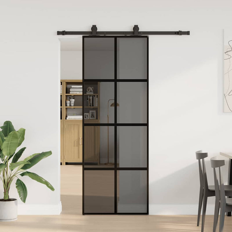 vidaXL fekete edzett üveg tolóajtó fémszerelék szettel 76x205 cm