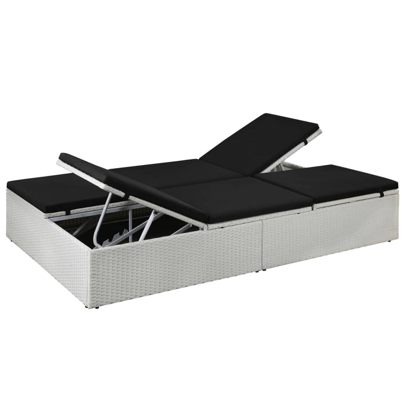 vidaXL fekete polyrattan napozóágy párnával