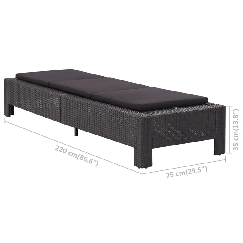 vidaXL fekete polyrattan napozóágy párnával